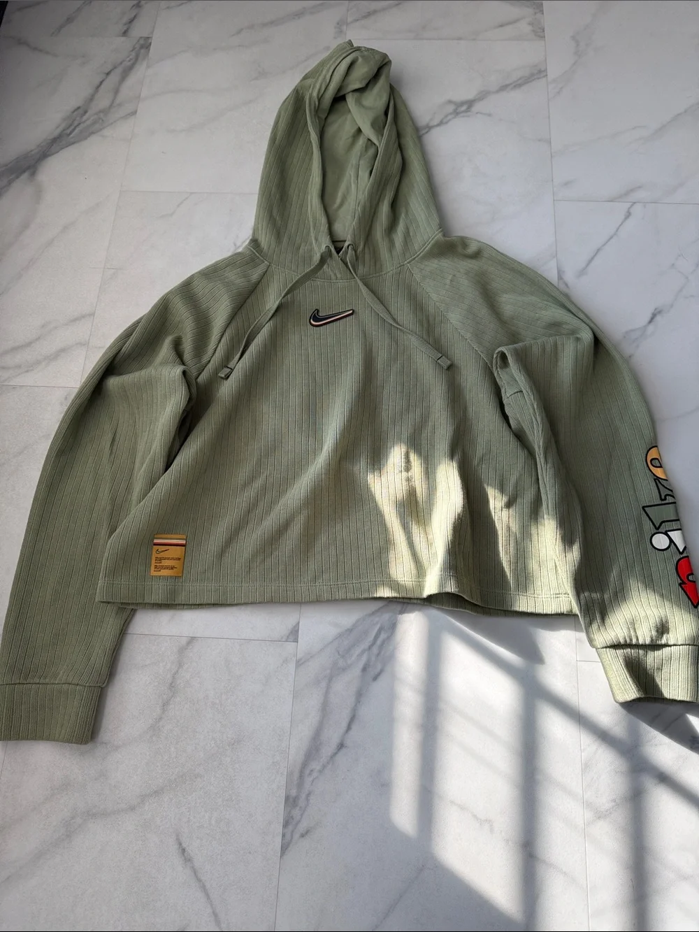 Nike green cropped hoodie. Great for a fun look
